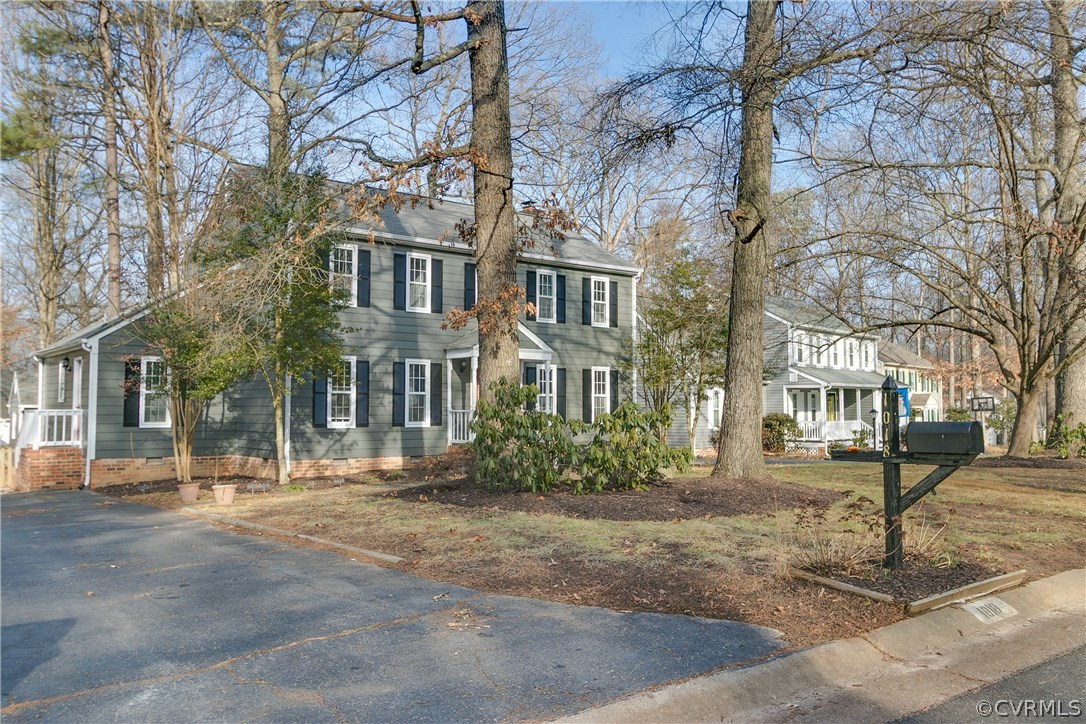 1018 Ashbrook Landing Road Midlothian, VA 23114 - Photo 45 of 46 a front view of a building with trees