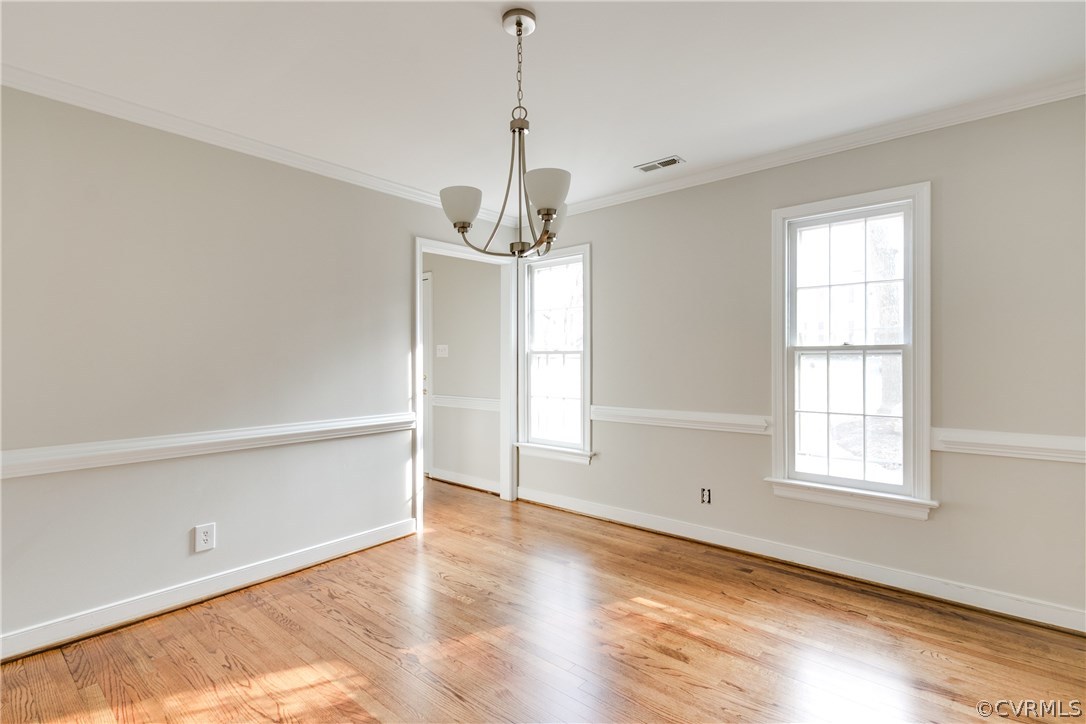 1018 Ashbrook Landing Road Midlothian, VA 23114 - Photo 6 of 46 a view of a room with wooden floor closet and windows