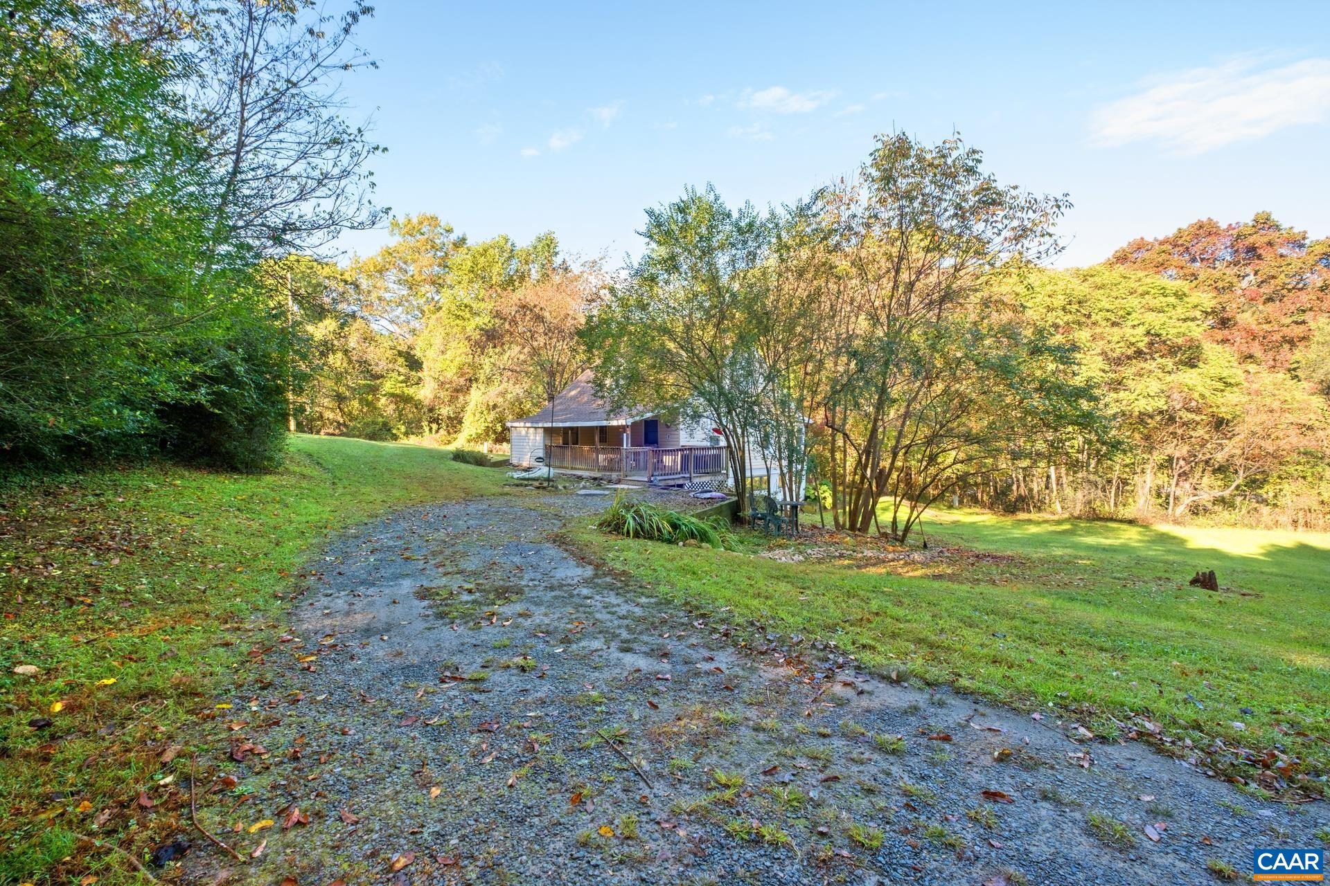 4601 Loving Road North Garden, VA 22959 - Photo 6 of 33 a view of a yard with palm trees