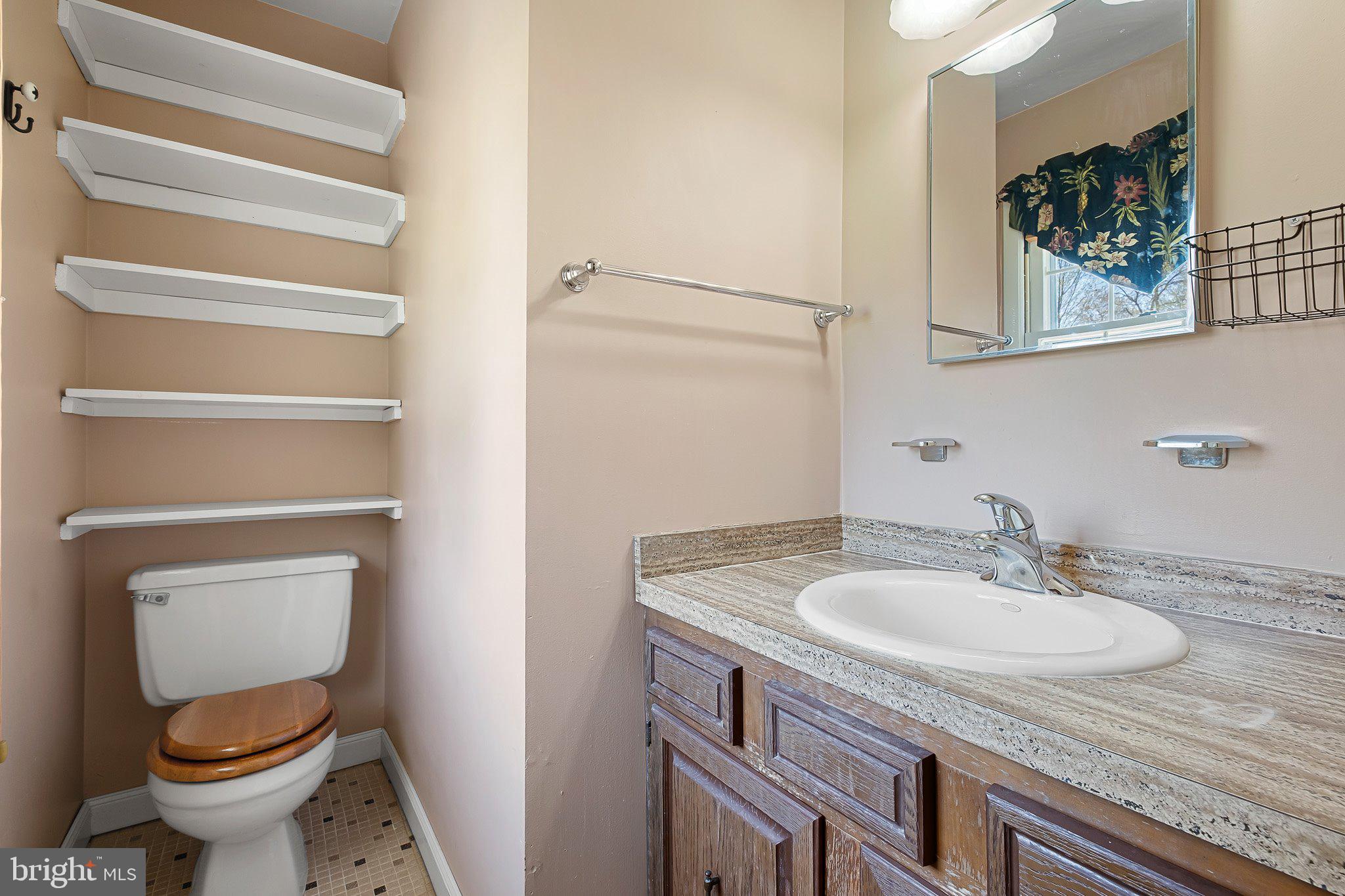 903 Clydesdale Drive Bear, DE 19701 - Photo 10 of 20 a bathroom with a sink and a toilet