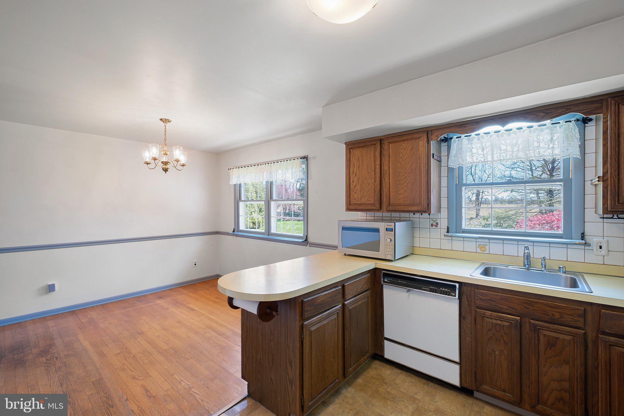 903 Clydesdale Drive Bear, DE 19701 - Photo 3 of 20 a kitchen with a sink window and cabinets