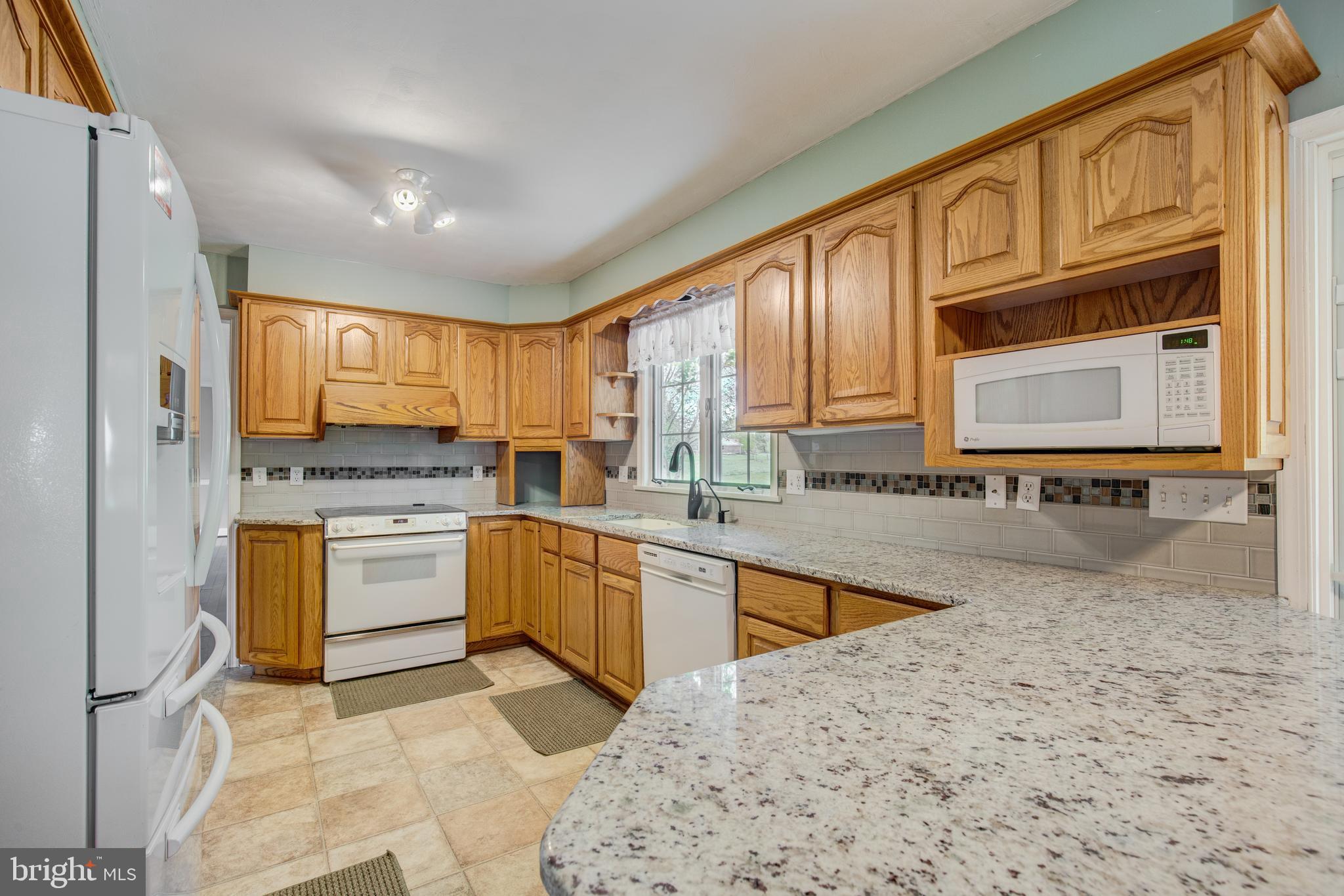 3111 Old Taneytown Road Westminster, MD 21158 - Photo 13 of 62 Updated kitchen with granite and newer cabinets
