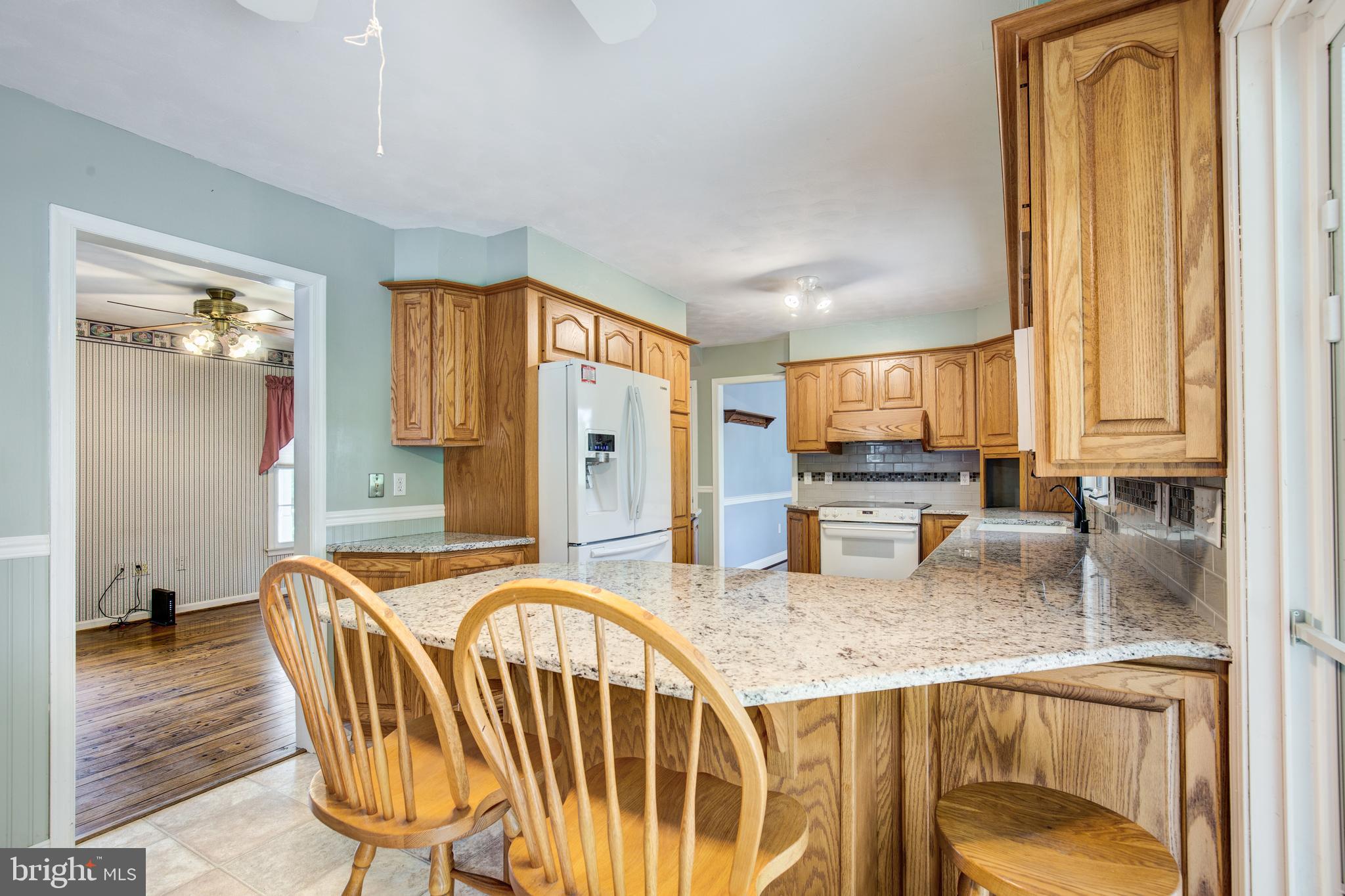 3111 Old Taneytown Road Westminster, MD 21158 - Photo 18 of 62 Kitchen breakfast bar w/ stools