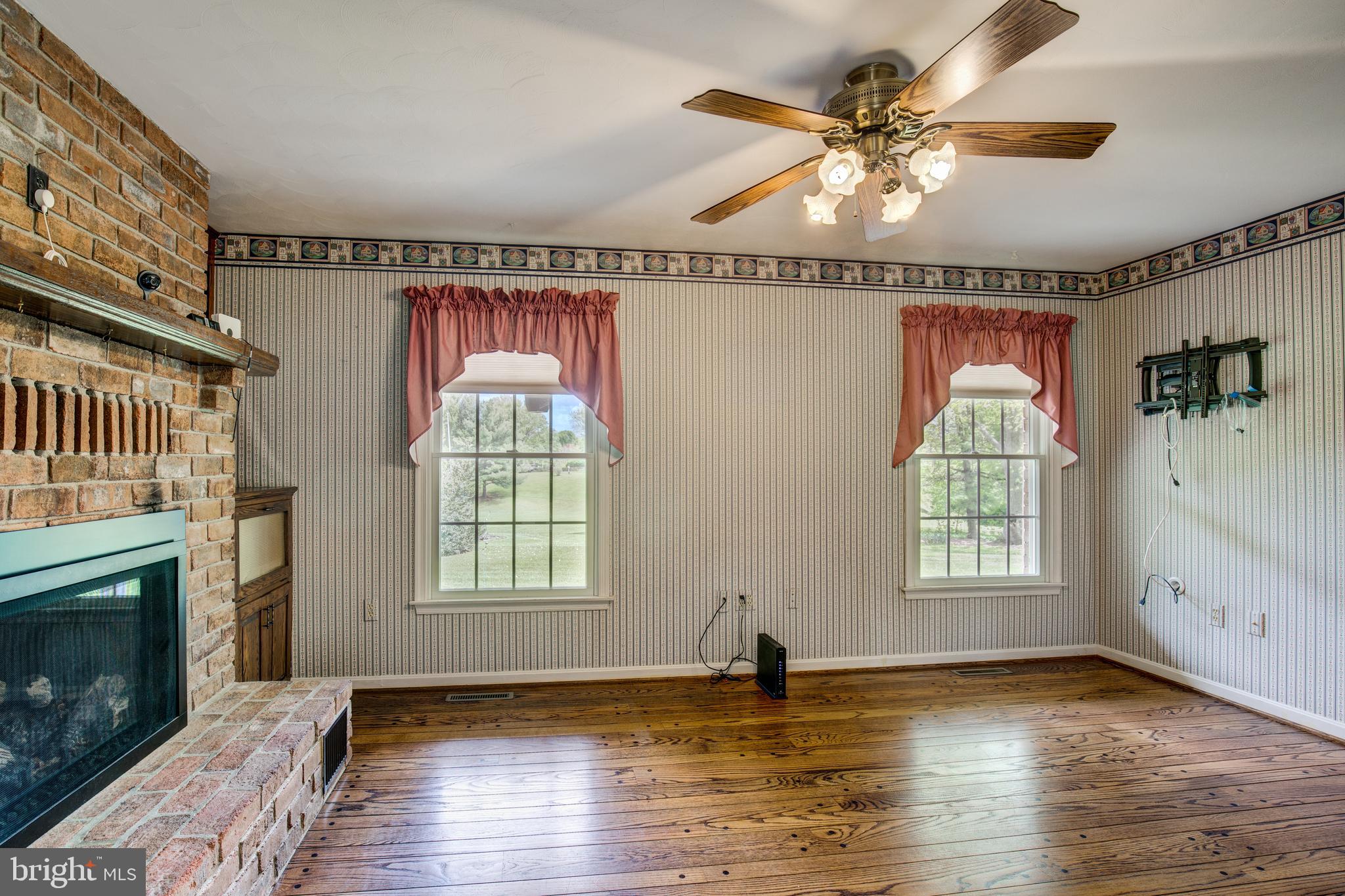 3111 Old Taneytown Road Westminster, MD 21158 - Photo 25 of 62 Family Room or Den with fireplace propane insert