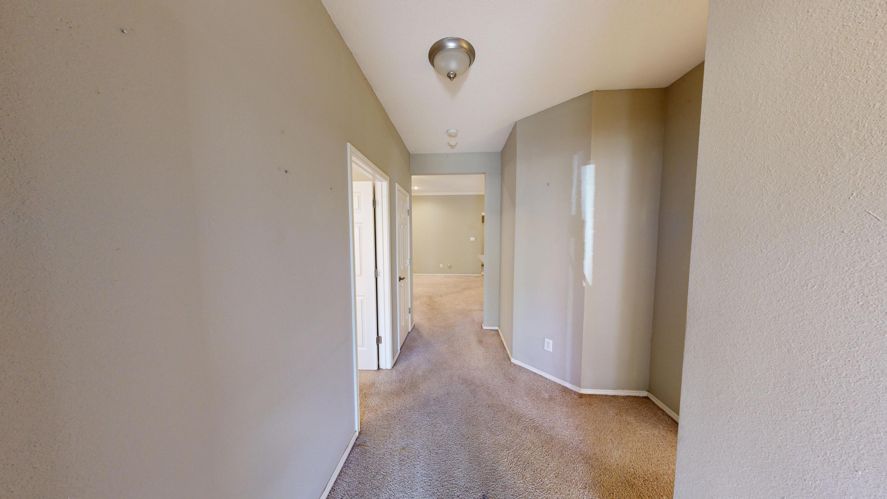 3511 104th Street Lubbock, TX 79423 - Photo 2 of 25 a view of a hallway with closet