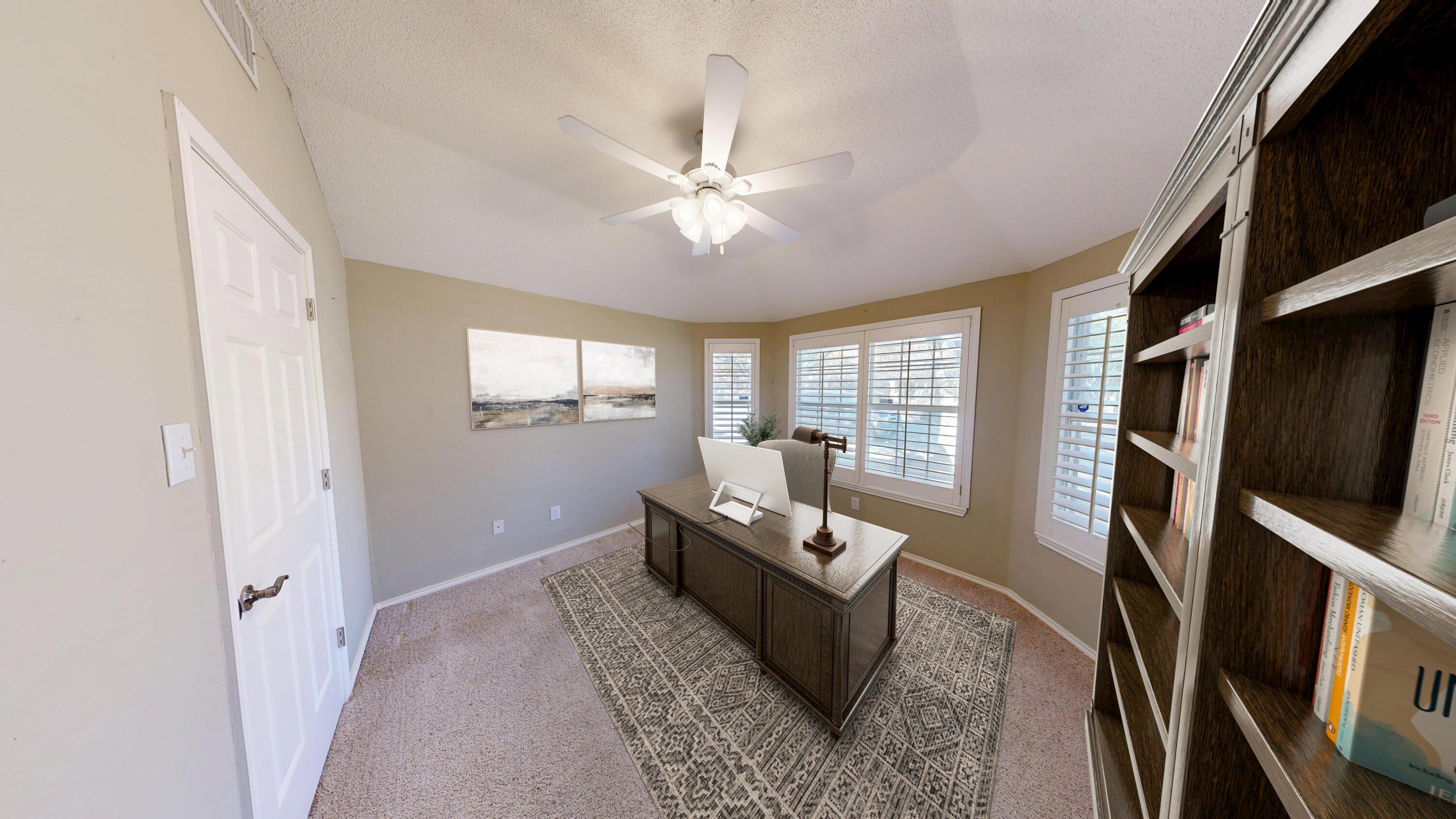 3511 104th Street Lubbock, TX 79423 - Photo 6 of 25 a living room with furniture and a window