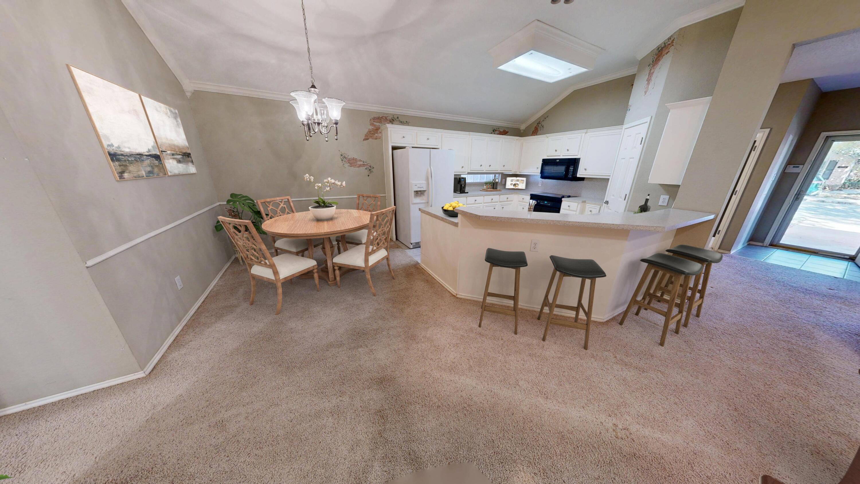 3511 104th Street Lubbock, TX 79423 - Photo 8 of 25 a living room with furniture a dining table and chairs