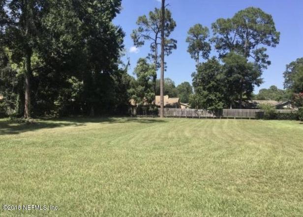 0 Beauclerc Bluff Road Jacksonville, FL 32257 - Photo 1 of 2 a view of swimming pool with lawn chairs and large trees