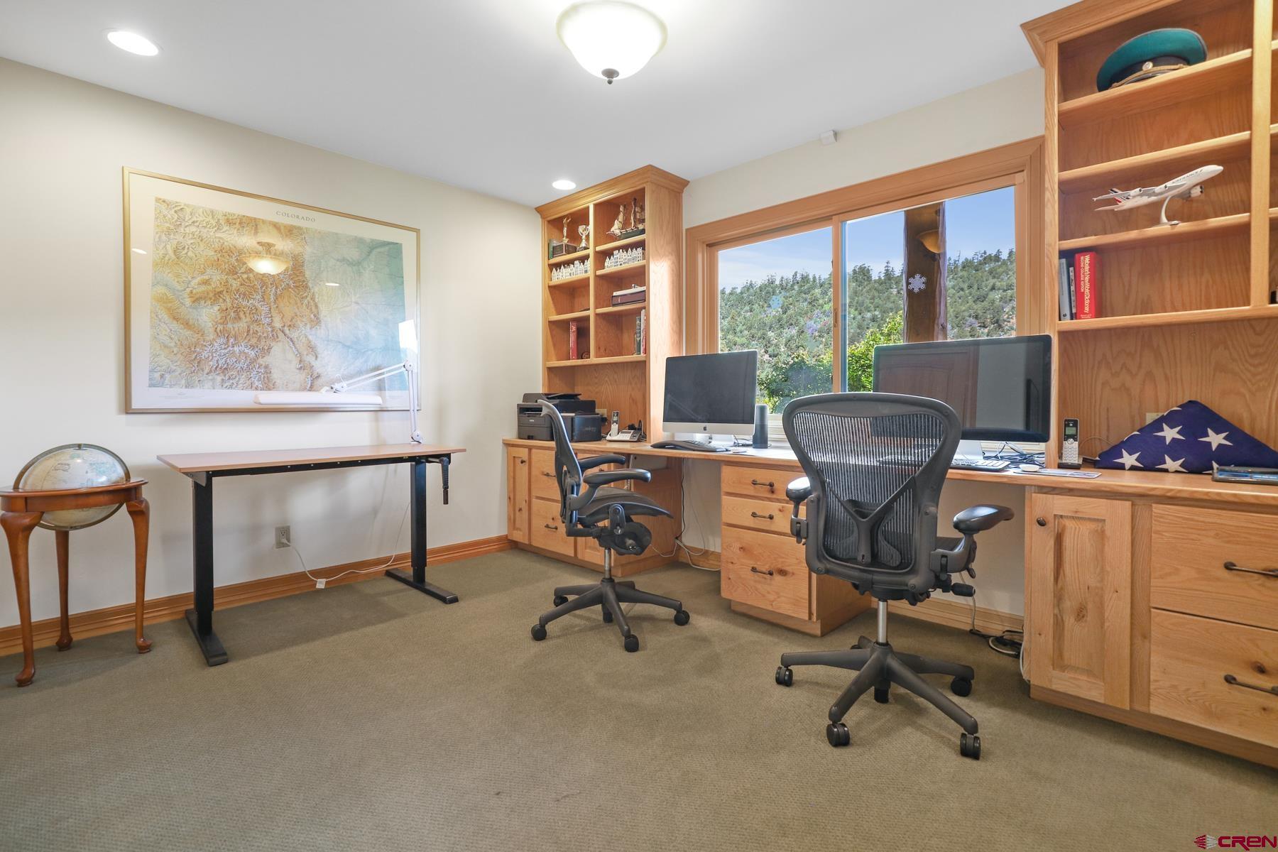 756 Horse Gulch Loop Durango, CO 81301 - Photo 21 of 35 a view of a workspace with furniture and a window