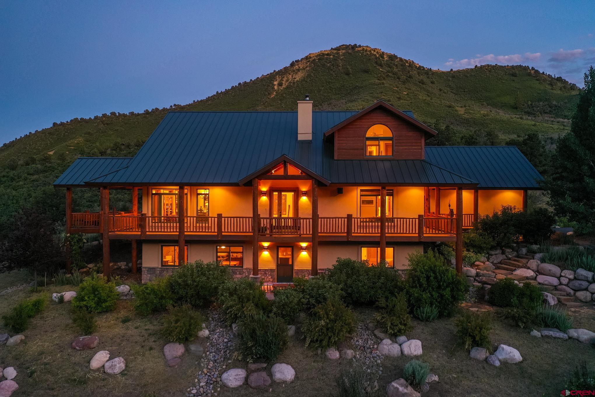 756 Horse Gulch Loop Durango, CO 81301 - Photo 23 of 35 a view of a house with a yard