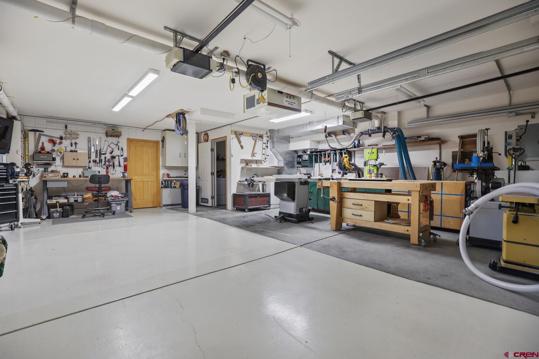 756 Horse Gulch Loop Durango, CO 81301 - Photo 33 of 35 a view of a garage with furniture