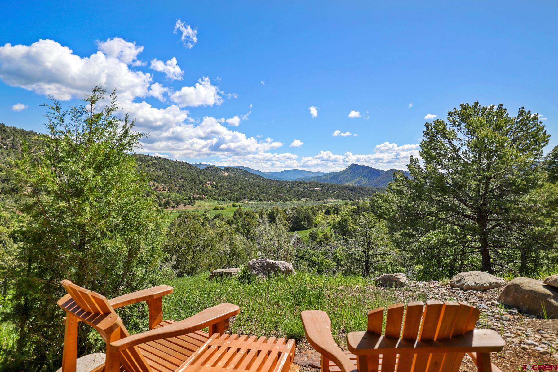 756 Horse Gulch Loop Durango, CO 81301 - Photo 35 of 35 a view of a two chairs in a backyard