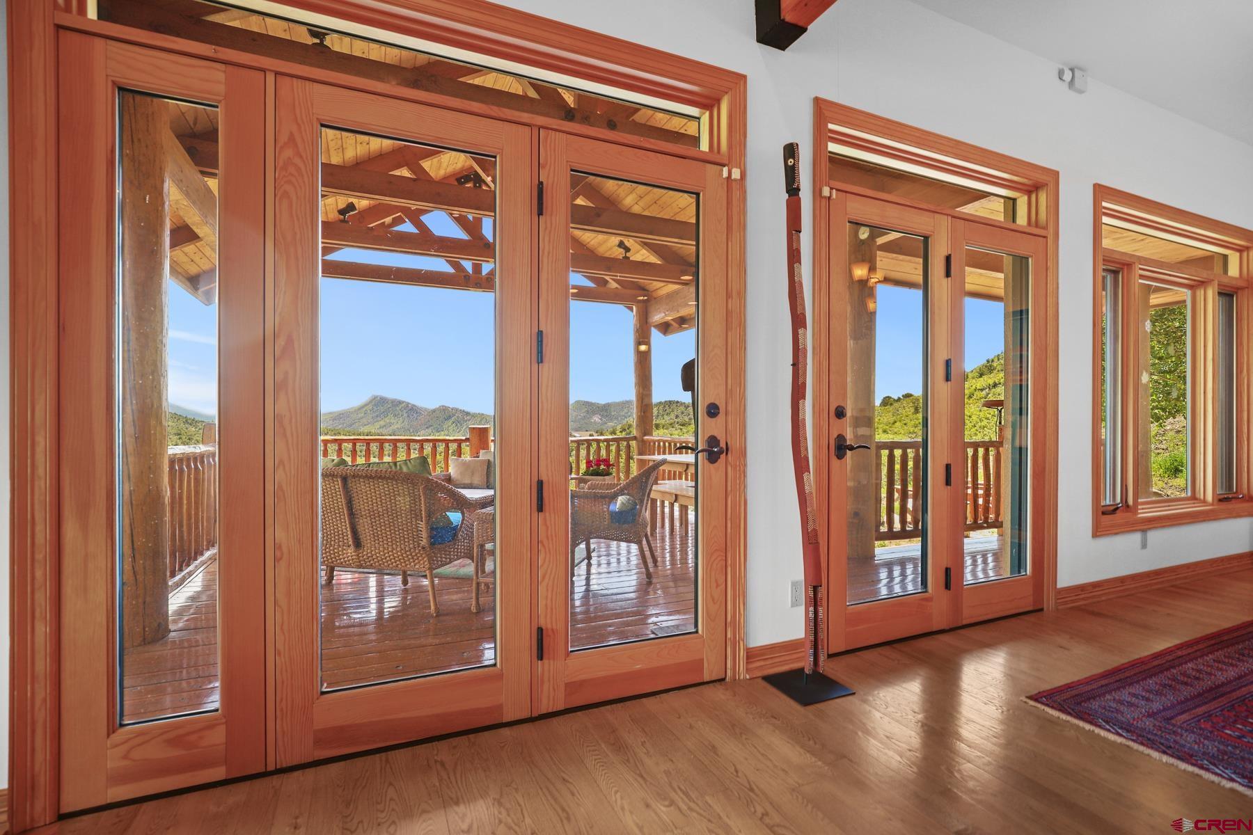 756 Horse Gulch Loop Durango, CO 81301 - Photo 6 of 35 a view of an entryway with wooden floor