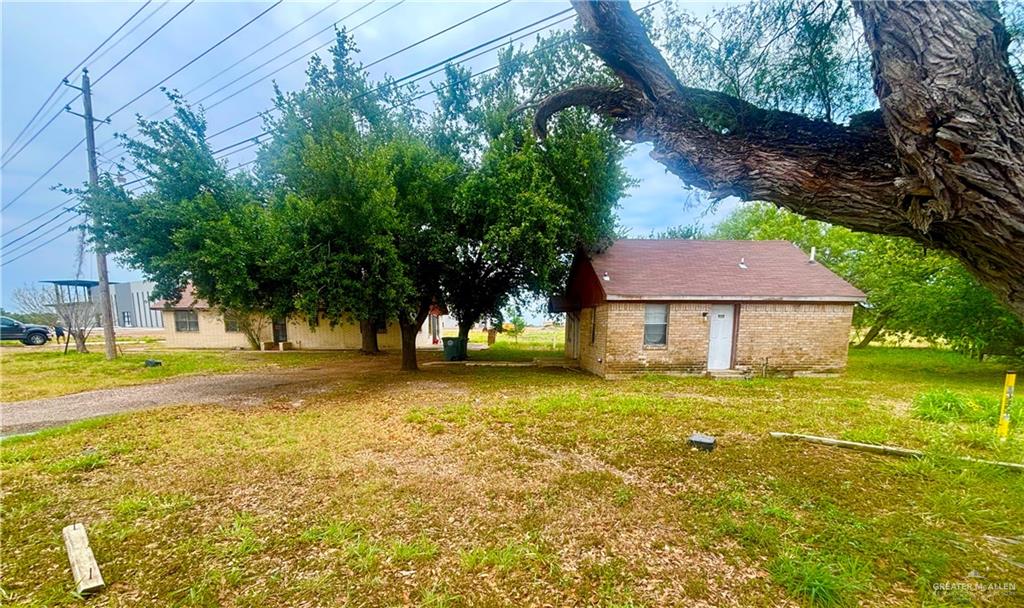 513 South Mile Road Mission, TX 78572 - Photo 2 of 4 a view of a house with a yard
