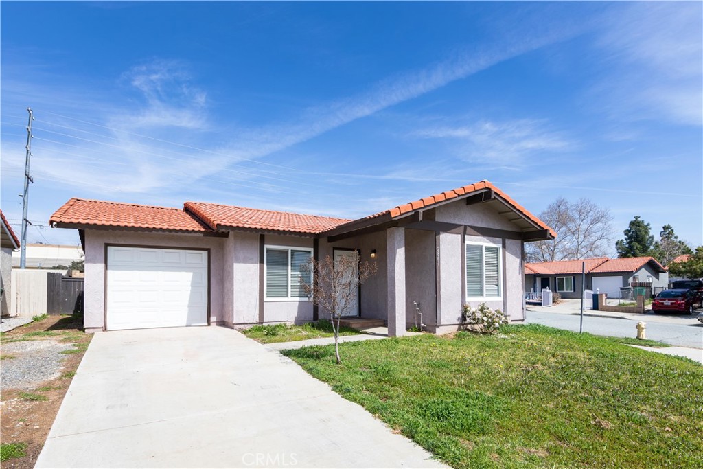 2861 Mohawk Road Banning, CA 92220 - Photo 1 of 1 a front view of a house with a yard