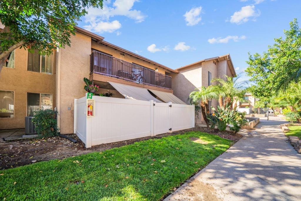 12750 Laurel Street, Unit 510 Lakeside, CA 92040 - Photo 2 of 19 a front view of a house with garden