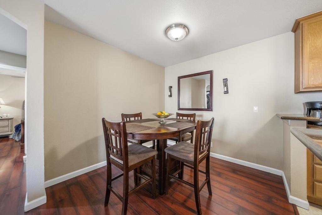 12750 Laurel Street, Unit 510 Lakeside, CA 92040 - Photo 7 of 19 a view of a dining room with furniture and wooden floor