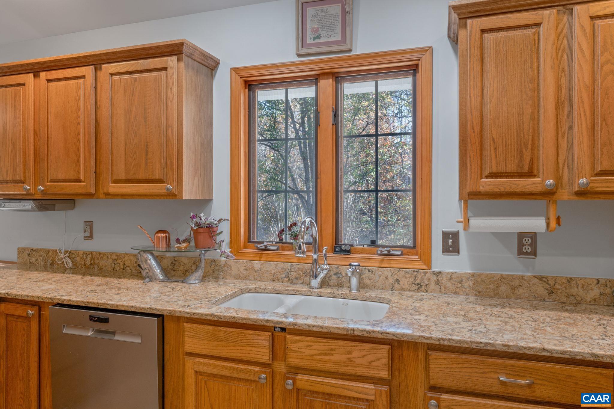30 Brougham Road Palmyra, VA 22963 - Photo 16 of 57 a kitchen with granite countertop sink and window