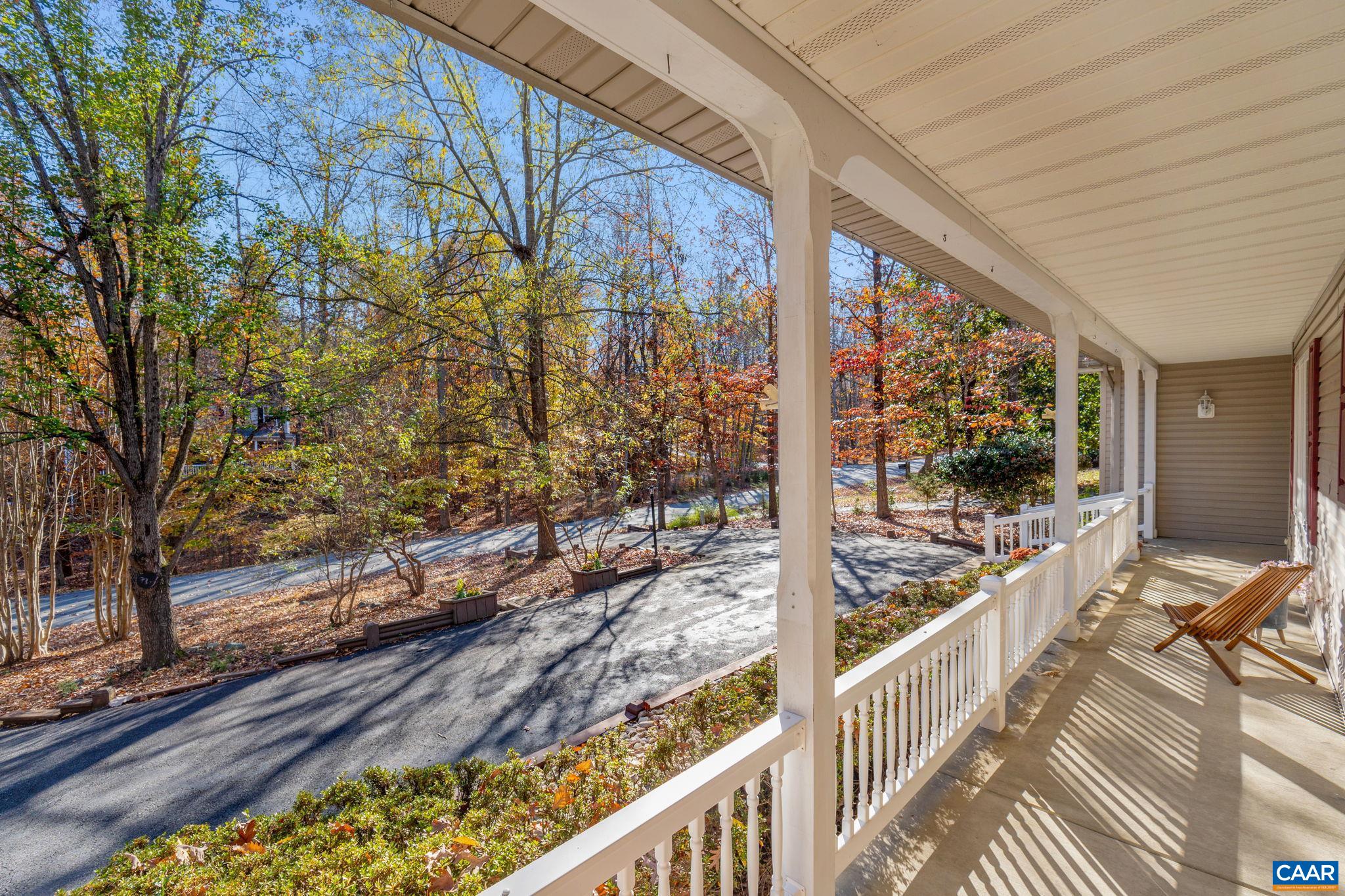 30 Brougham Road Palmyra, VA 22963 - Photo 40 of 57 a view of a balcony with wooden floor and iron fence