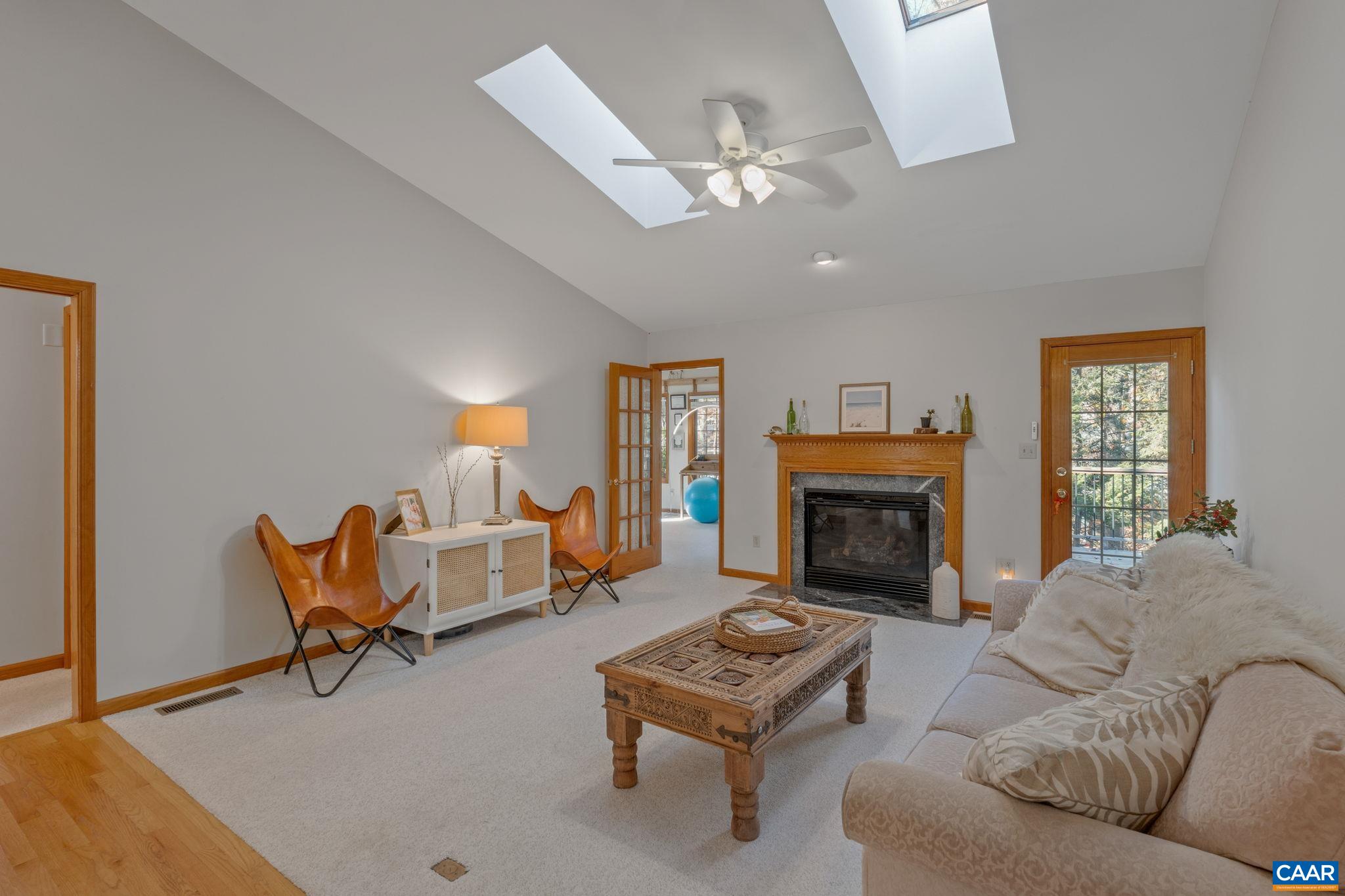 30 Brougham Road Palmyra, VA 22963 - Photo 6 of 57 a living room with furniture and a fireplace