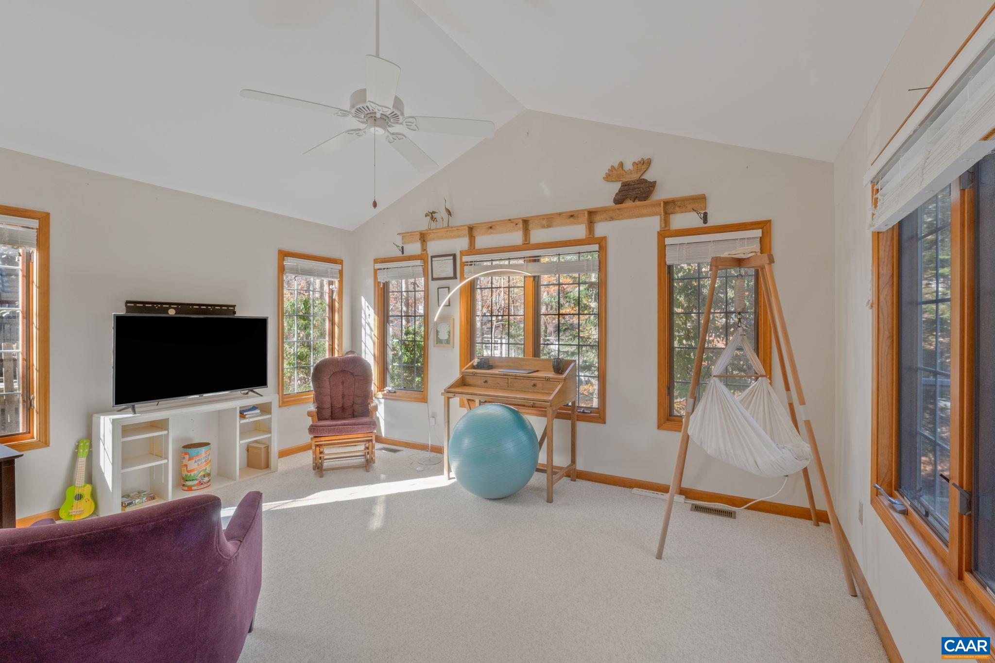 30 Brougham Road Palmyra, VA 22963 - Photo 9 of 57 a living room with furniture and a flat screen tv