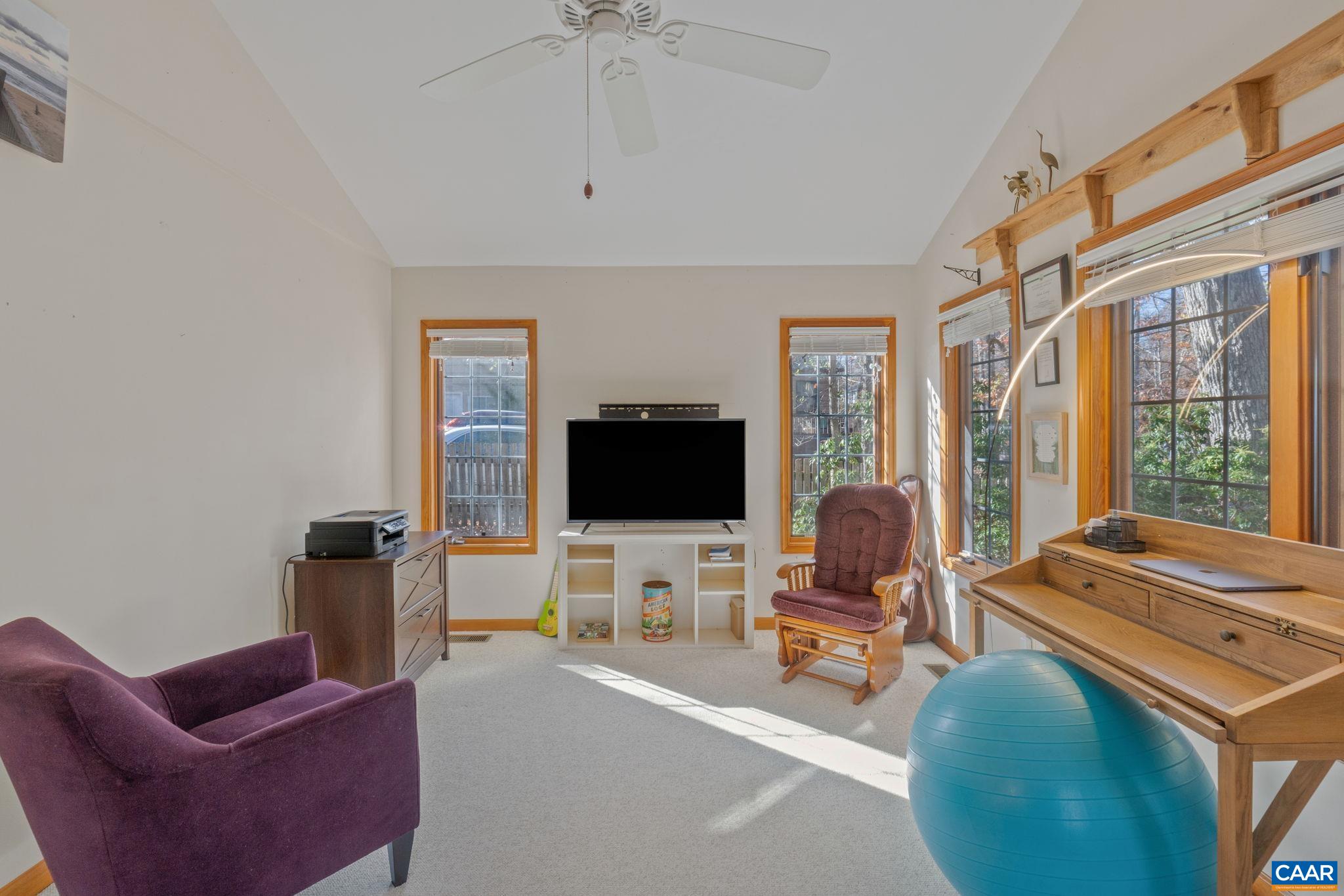 30 Brougham Road Palmyra, VA 22963 - Photo 10 of 57 a living room with furniture and a flat screen tv