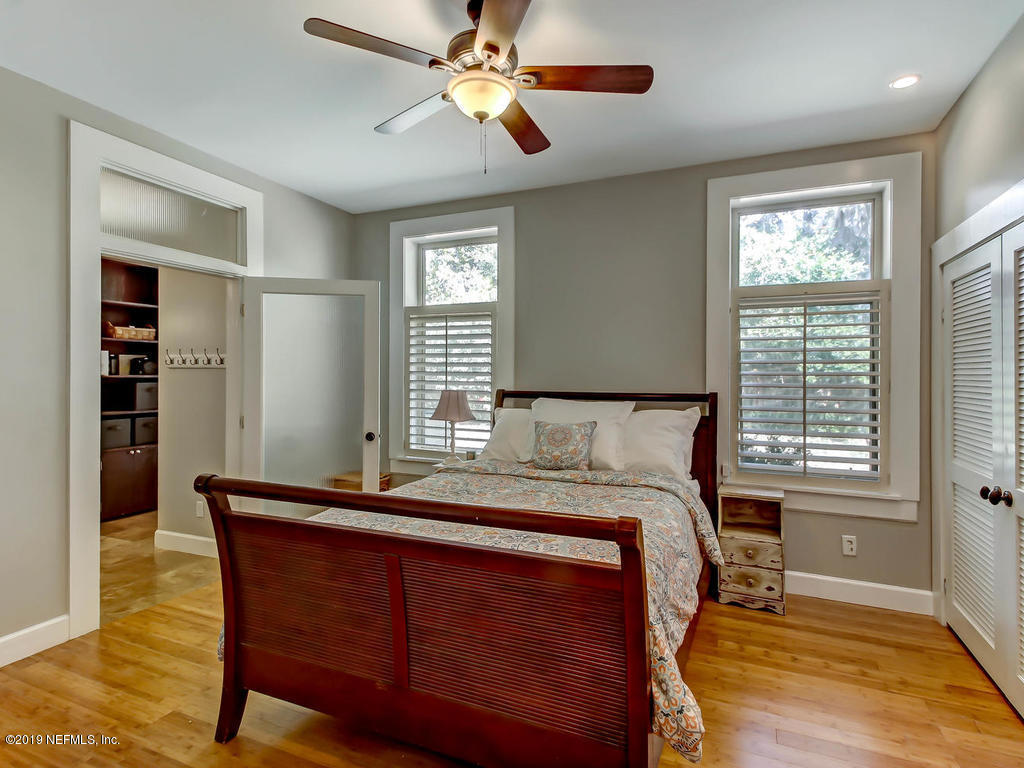 945 Mapleton Terrace Jacksonville, FL 32207 - Photo 17 of 45 a bedroom with a bed and a window