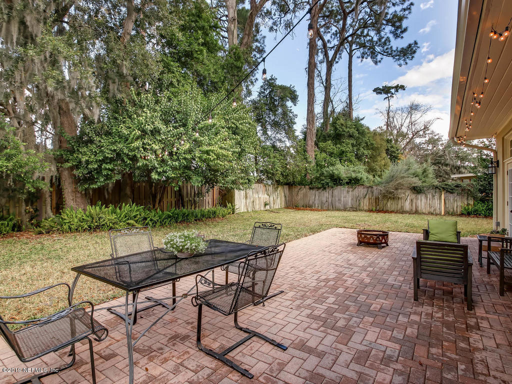 945 Mapleton Terrace Jacksonville, FL 32207 - Photo 26 of 45 a view of a lake with table and chairs