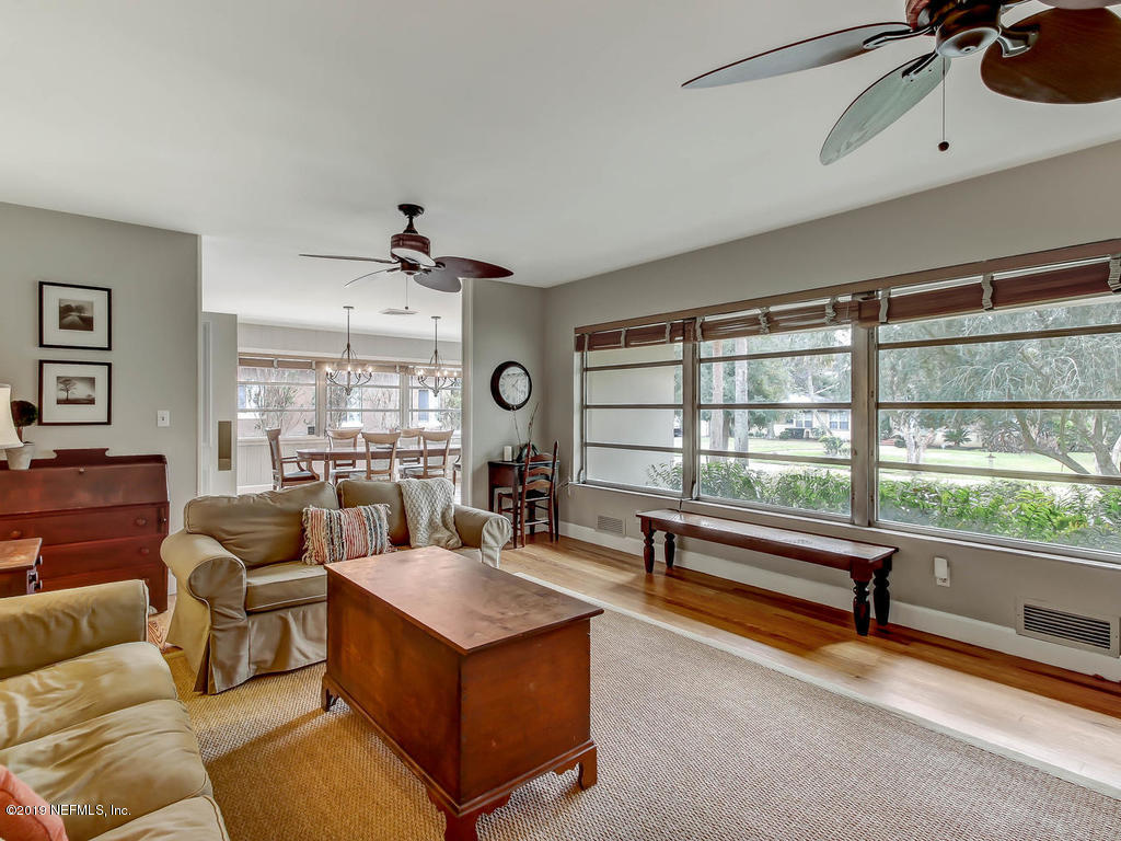 945 Mapleton Terrace Jacksonville, FL 32207 - Photo 28 of 45 a living room with furniture and a large window