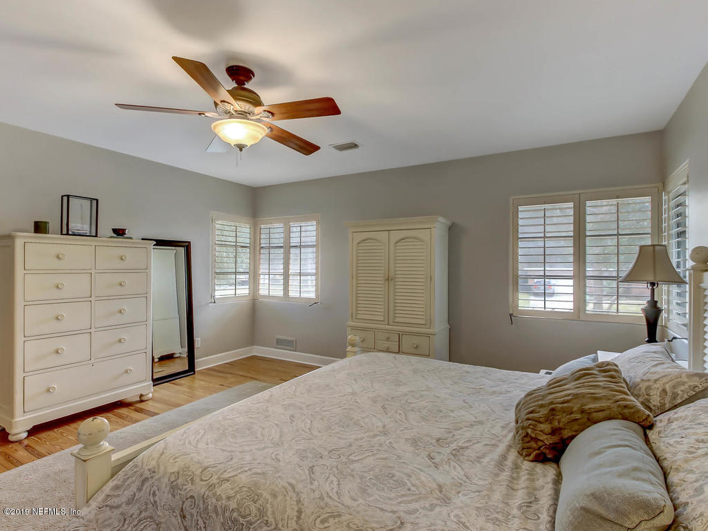 945 Mapleton Terrace Jacksonville, FL 32207 - Photo 32 of 45 a bedroom with a bed and a window