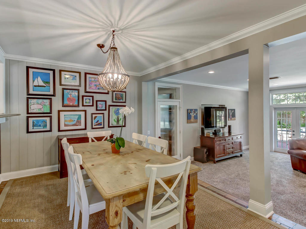 945 Mapleton Terrace Jacksonville, FL 32207 - Photo 35 of 45 a view of a dining room with furniture window and wooden floor