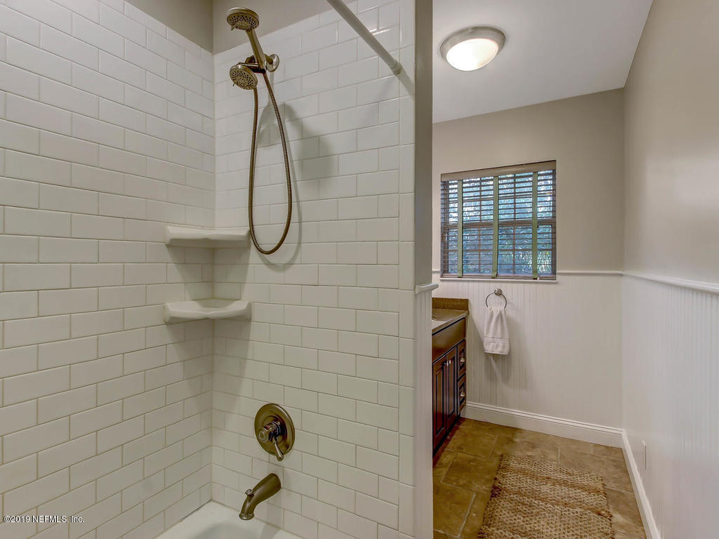 945 Mapleton Terrace Jacksonville, FL 32207 - Photo 36 of 45 a bathroom with a shower