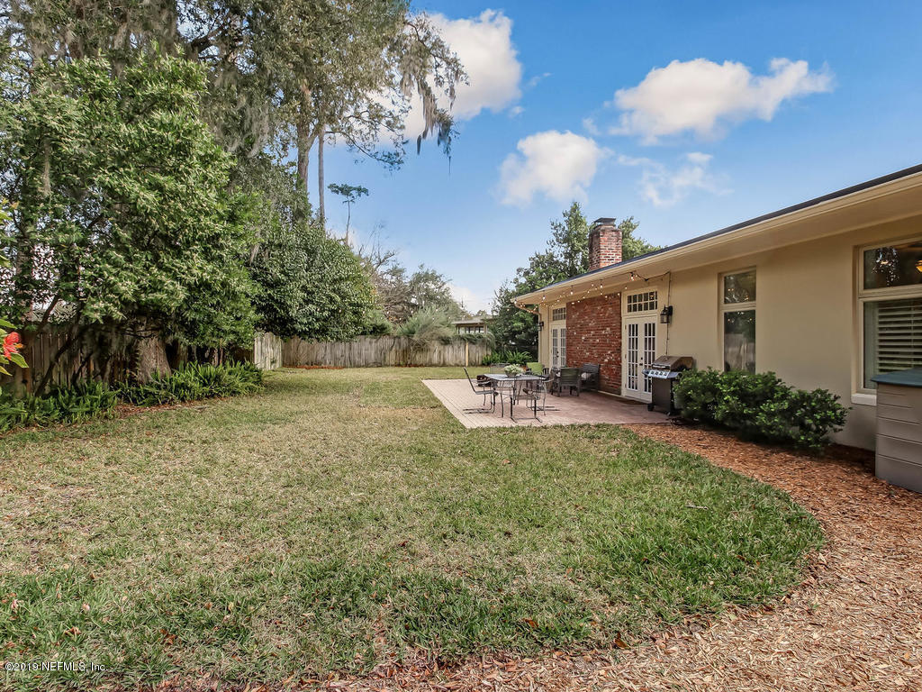 945 Mapleton Terrace Jacksonville, FL 32207 - Photo 39 of 45 a view of a house with backyard and sitting area