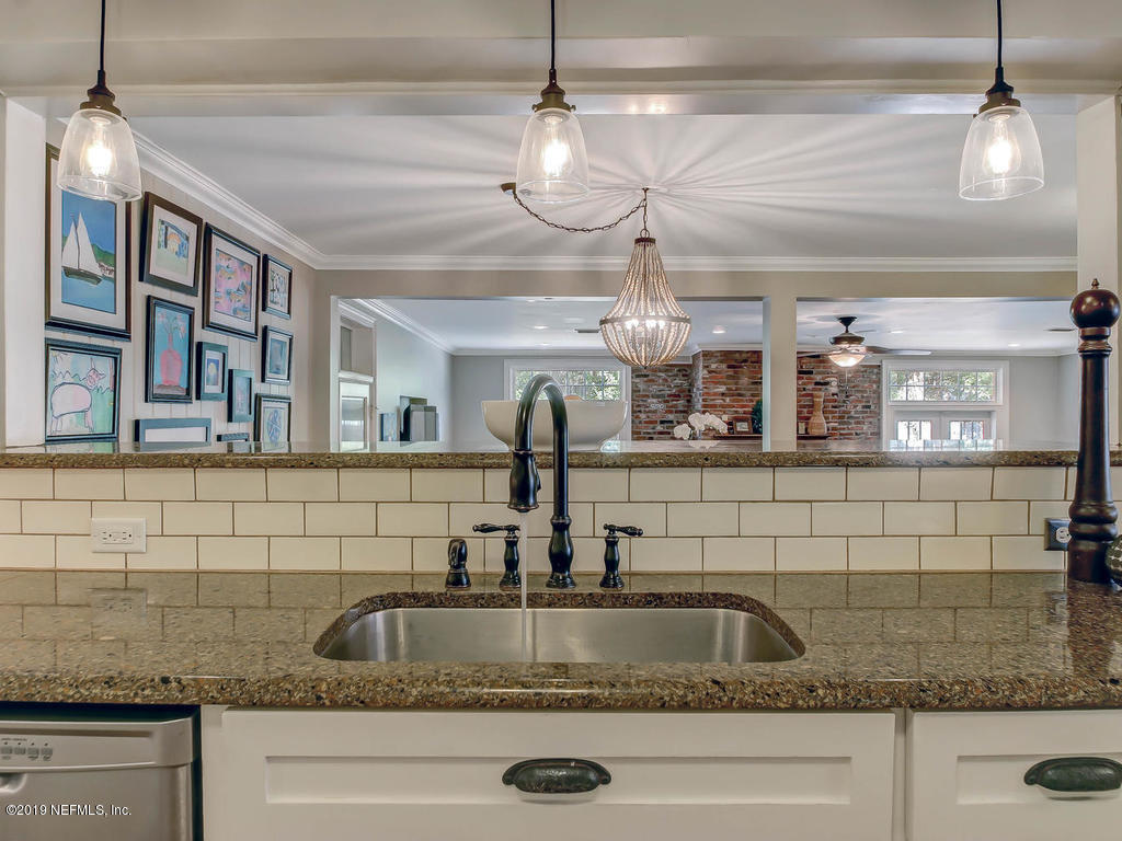 945 Mapleton Terrace Jacksonville, FL 32207 - Photo 45 of 45 a kitchen with a sink and a granite counter top