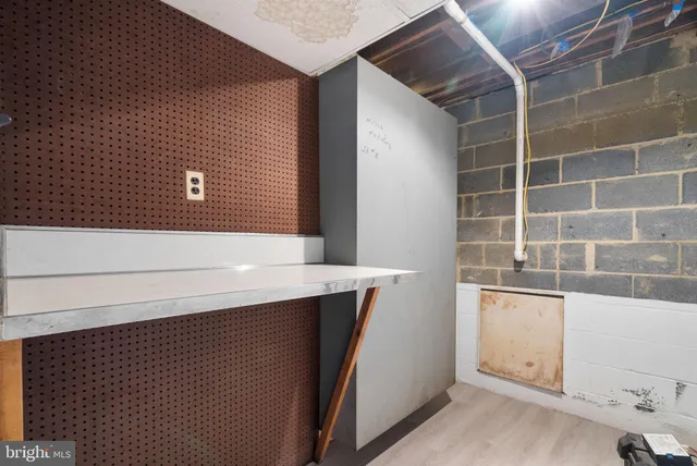 a view of cabinets and wooden floor