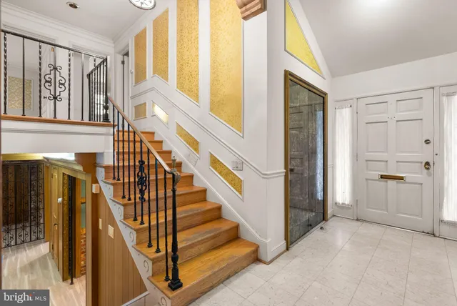 a view of an entryway with staircase