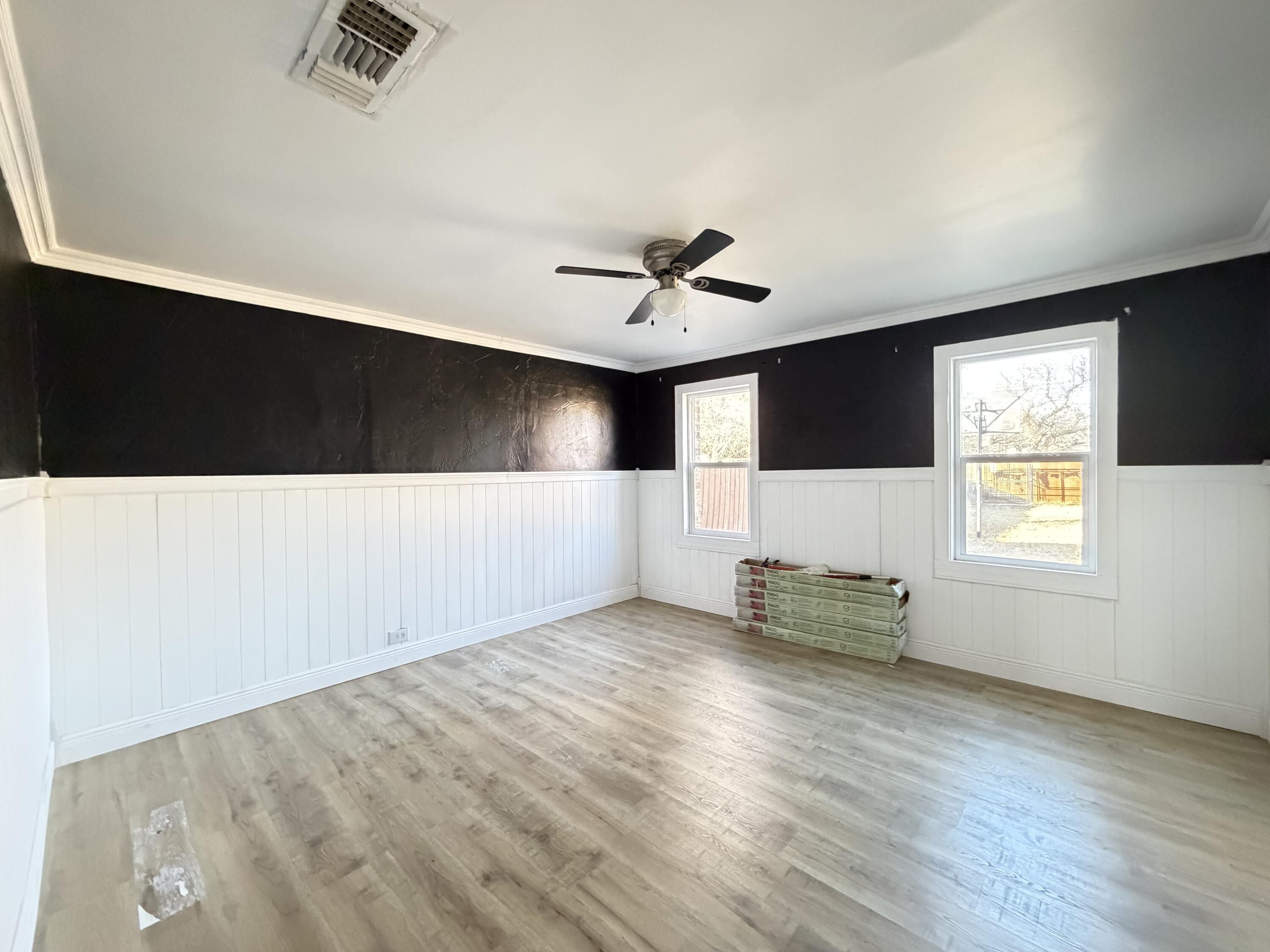 209 East 15th Street Littlefield, TX 79339 - Photo 14 of 18 a view of an empty room with a window
