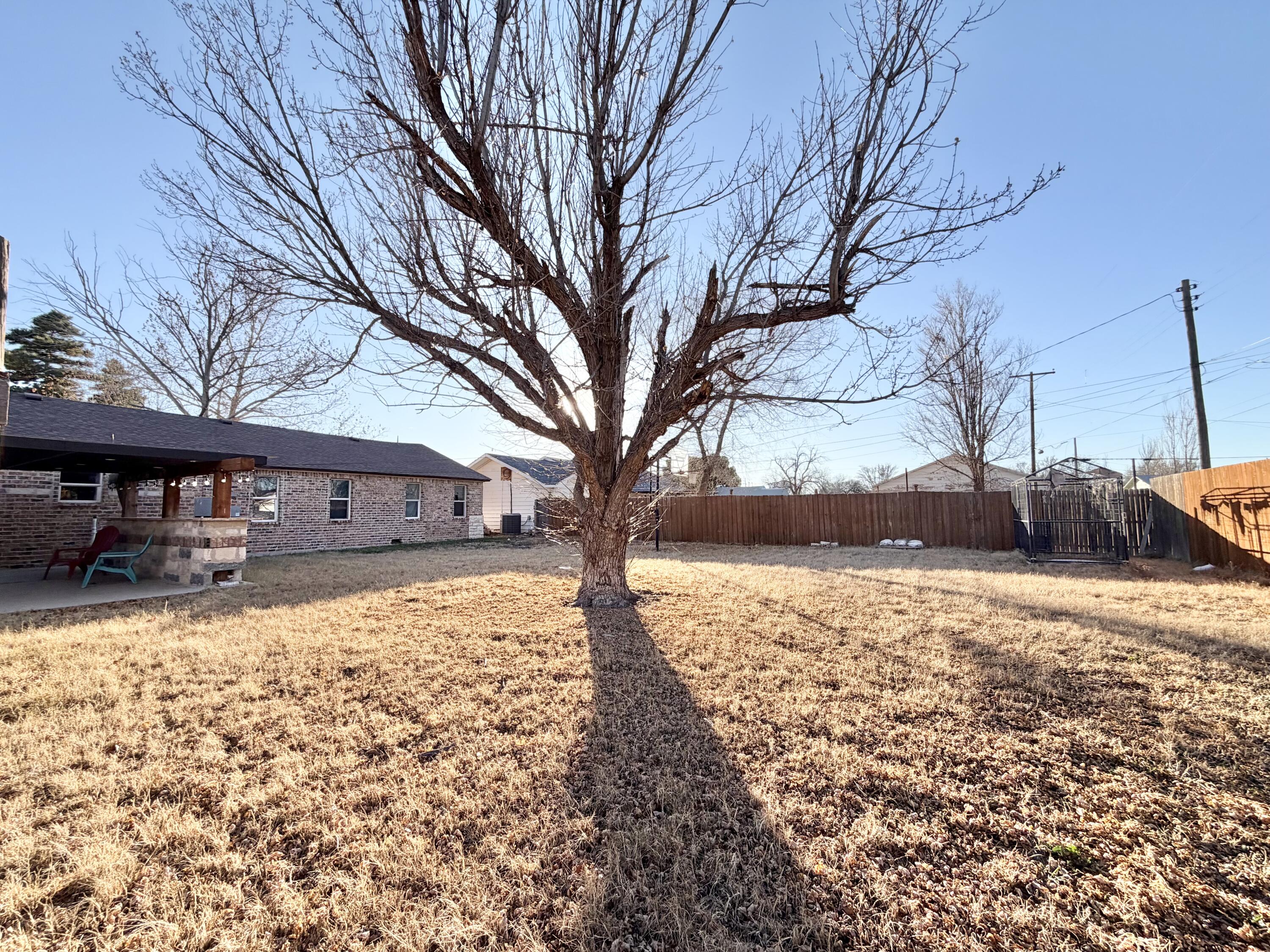 209 East 15th Street Littlefield, TX 79339 - Photo 18 of 18 a street view covered with snow