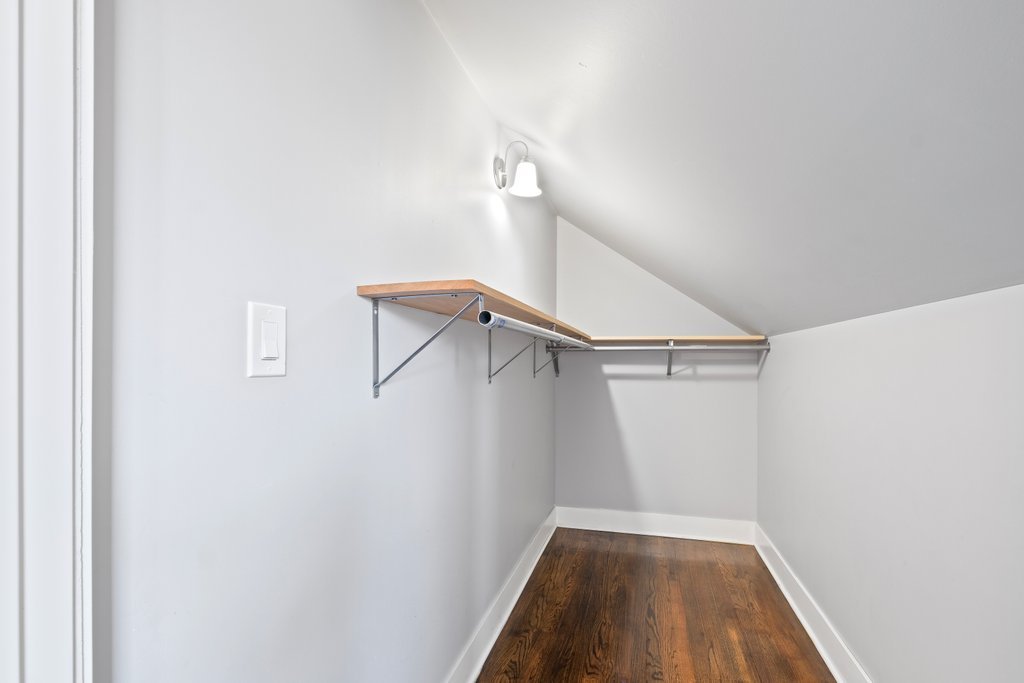 8014 South May Street Chicago, IL 60620 - Photo 33 of 50 a view of small space with racks on the wall