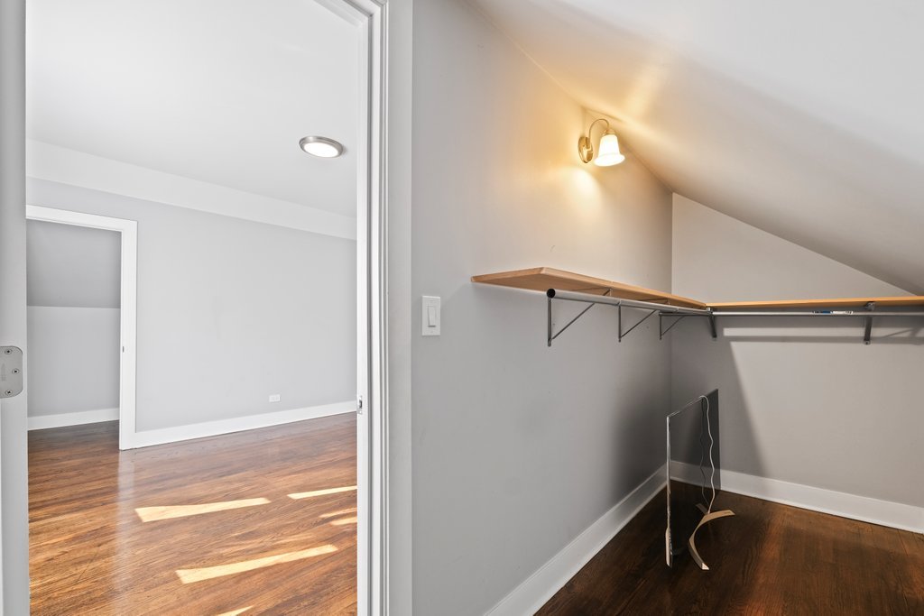 8014 South May Street Chicago, IL 60620 - Photo 34 of 50 a view of a room with wooden floor and windows