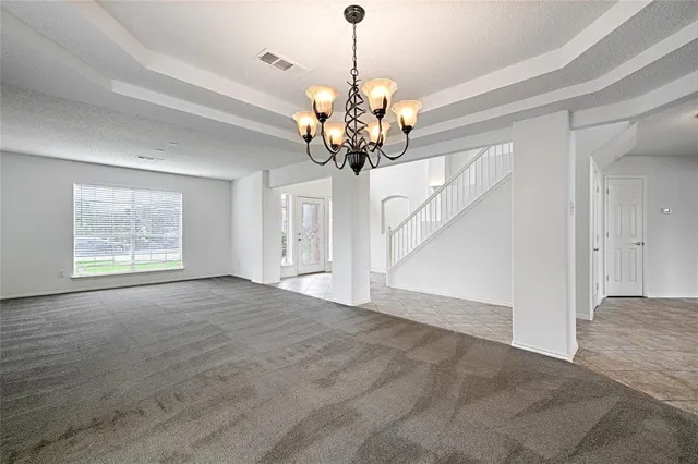 a view of a chandelier in a room