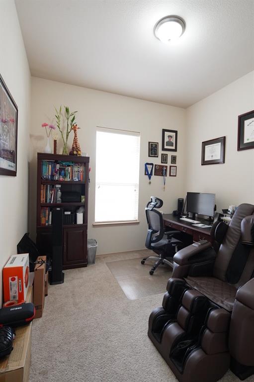 4508 Fox Rio Trail Arlington, TX 76017 - Photo 19 of 28 a living room with furniture and a window