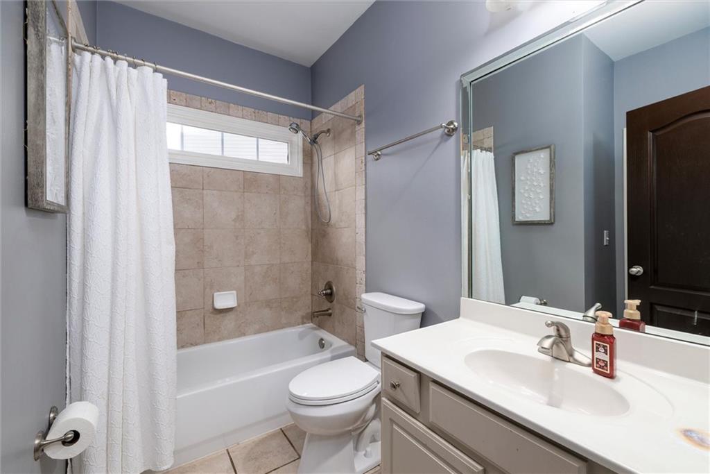 2016 Portage Point Southeast Lawrenceville, GA 30045 - Photo 19 of 44 a bathroom with a sink toilet tub and shower