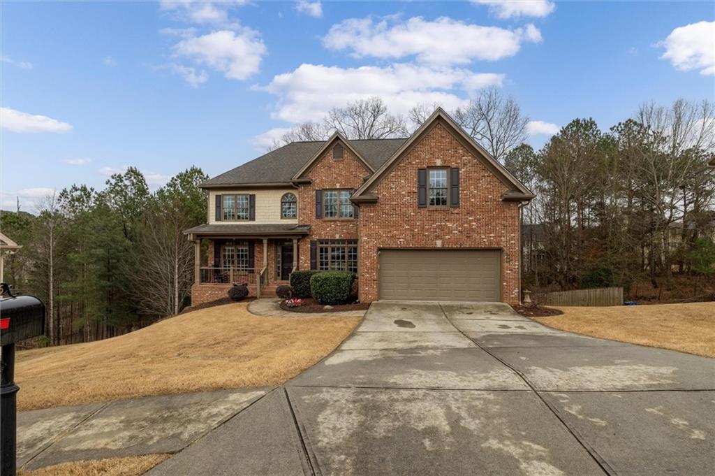 2016 Portage Point Southeast Lawrenceville, GA 30045 - Photo 2 of 44 a front view of a house with yard