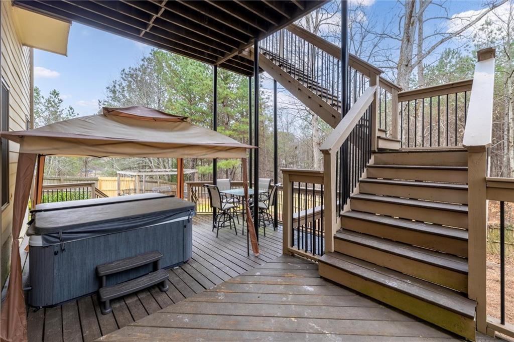 2016 Portage Point Southeast Lawrenceville, GA 30045 - Photo 30 of 44 a view of staircase with a table and chairs
