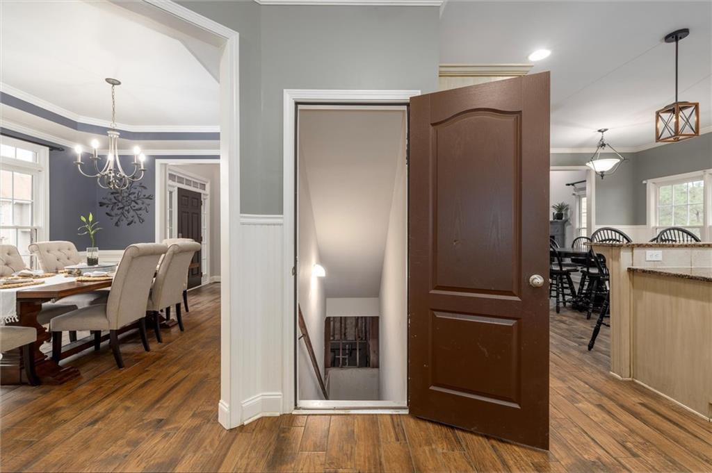 2016 Portage Point Southeast Lawrenceville, GA 30045 - Photo 34 of 44 a living room with furniture and a wooden floor