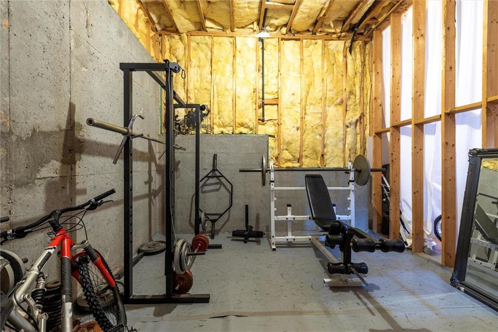 2016 Portage Point Southeast Lawrenceville, GA 30045 - Photo 39 of 44 a view of a room with gym equipment