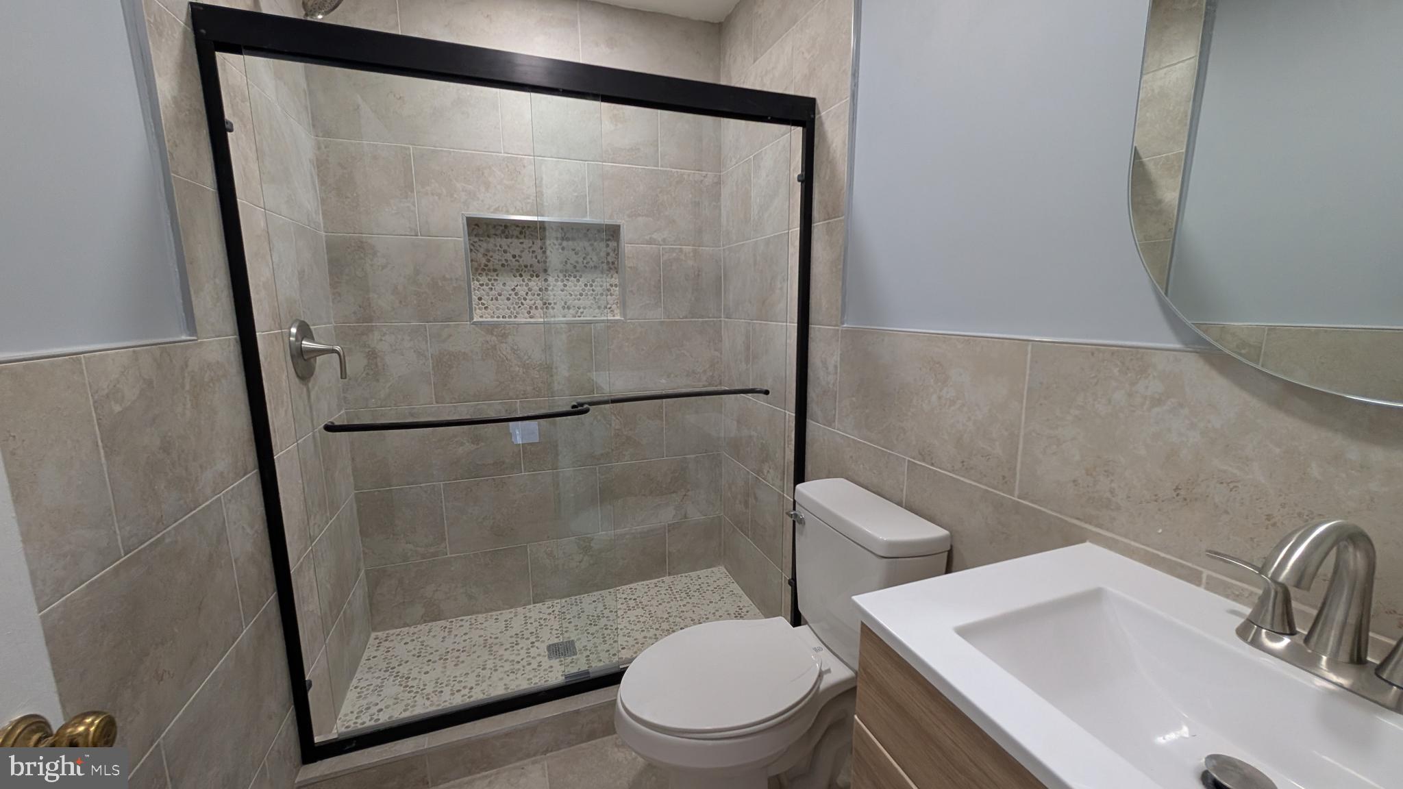 354 Valley Mill Road Winchester, VA 22602 - Photo 30 of 34 a bathroom with a sink and a mirror