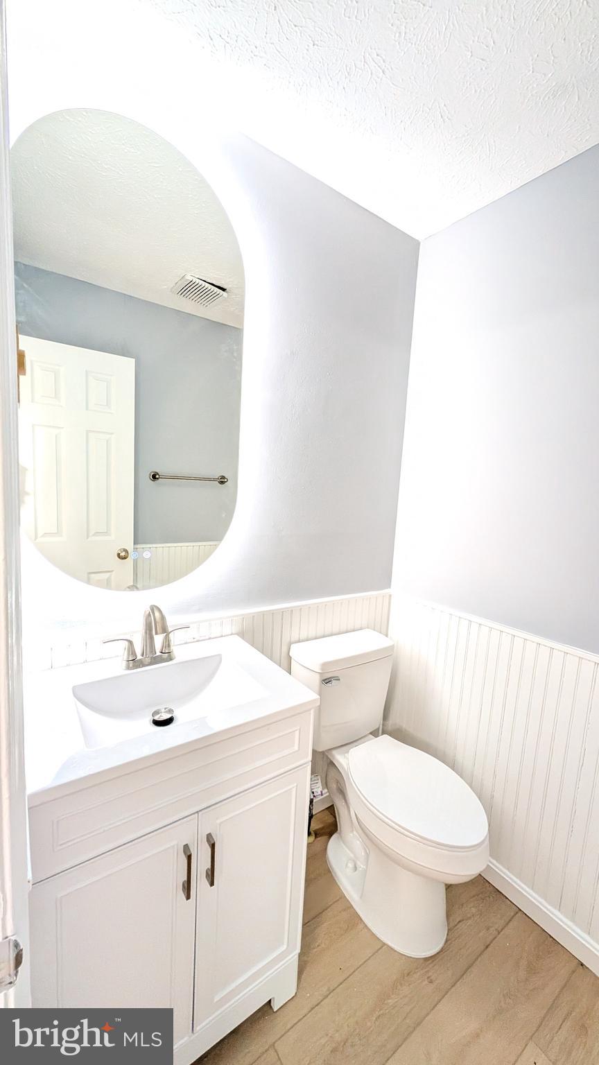 354 Valley Mill Road Winchester, VA 22602 - Photo 6 of 34 a bathroom with a sink a toilet and mirror