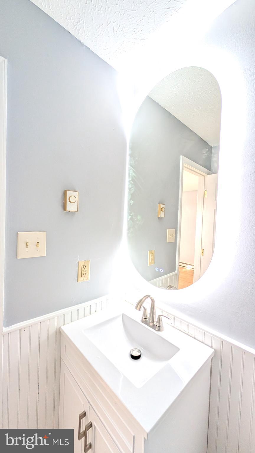 354 Valley Mill Road Winchester, VA 22602 - Photo 7 of 34 a bathroom with a sink and a mirror